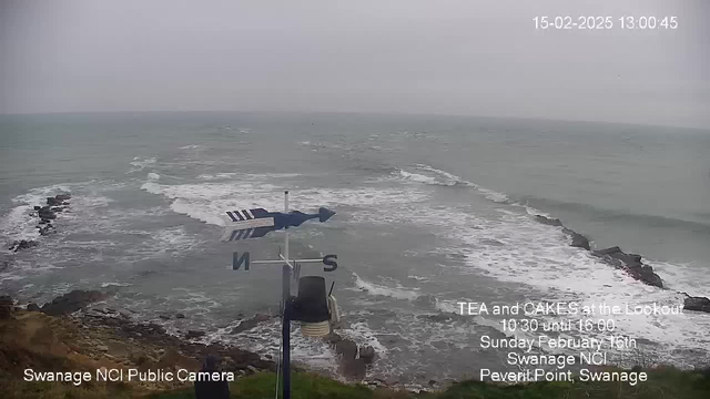 A coastal view with turbulent gray waters and white-capped waves crashing against rocky outcrops. The sky is overcast, giving a gloomy atmosphere. In the foreground, a weather vane points north, while text is displayed in the lower section indicating an event for "Tea and Cakes" at a lookout, along with the date and location details.